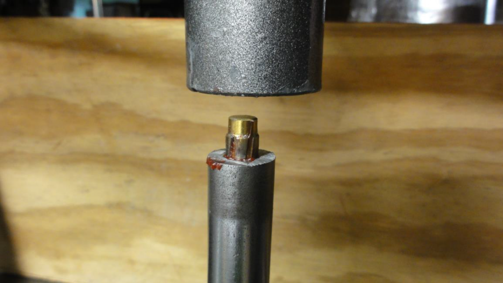 Pushing the rifling button through