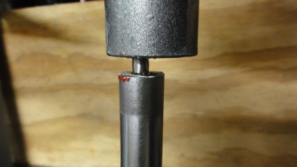 Pushing the rifling button through